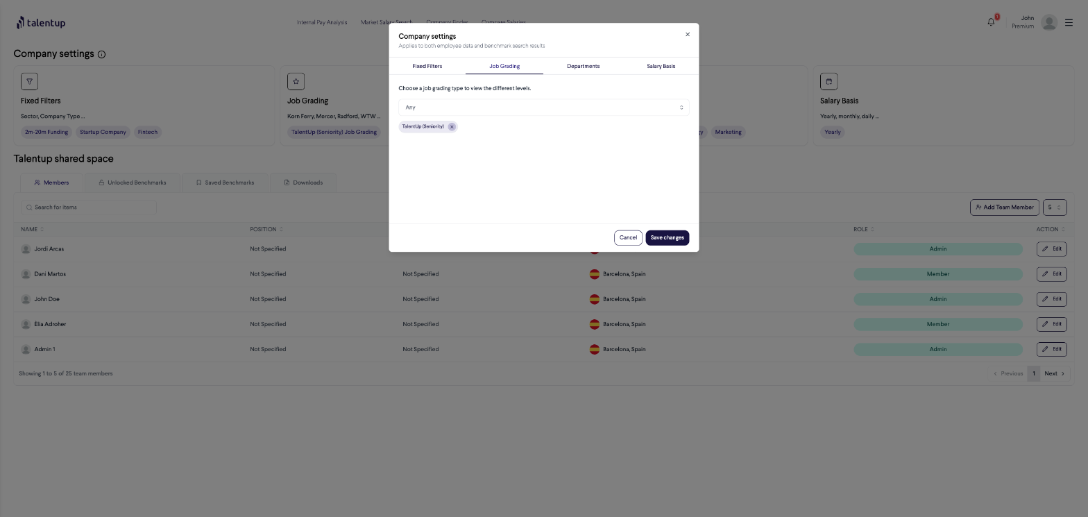 Company Settings modal showing the Job Grading tab with a dropdown to select the job grading framework and TalentUp (Seniority) currently selected